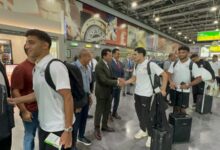 وزير الرياضة يودع المنتخب الوطني بمطار القاهرة